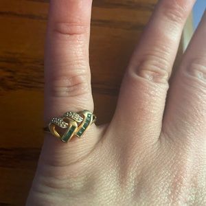 Gold ring with emeralds